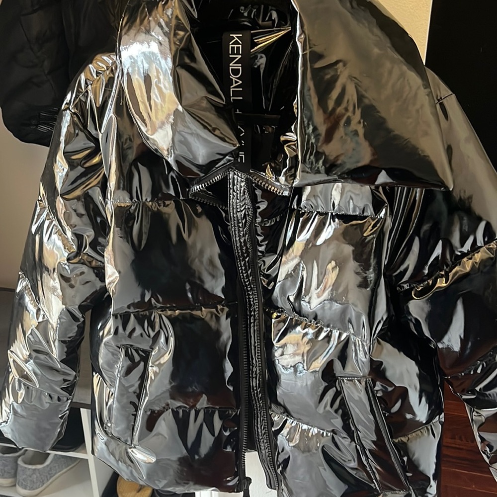 Shiny black puffer coat